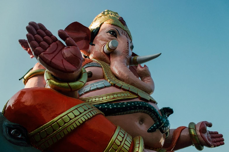 a close up of a statue of an elephant, pexels contest winner, samikshavad, a massive celestial giant god, avatar image, waving, pink