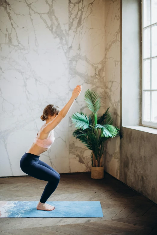 a woman doing a yoga pose in front of a window, marble walls, next to a plant, squatting, very consistent