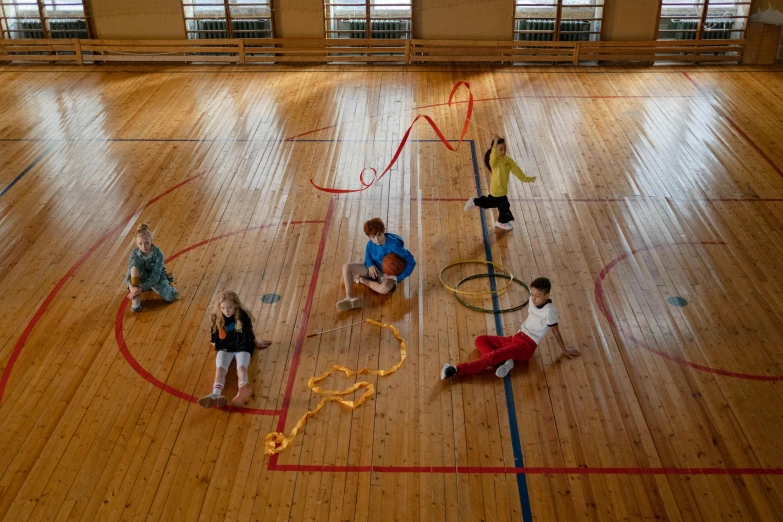 a group of people sitting on top of a wooden floor, dribble, reykjavik junior college, gestural lines, badminton, full - body artwork