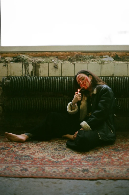 a woman sitting on the floor next to a dog, an album cover, inspired by Elsa Bleda, pexels contest winner, visual art, with a cigarette in its mouth, asian woman, with a bruised face and bruises, covered in ketchup