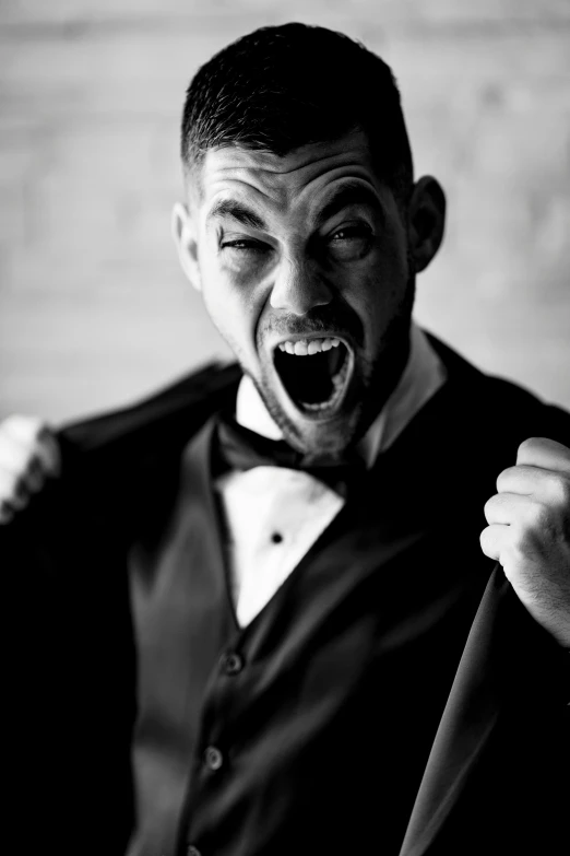 a black and white photo of a man in a tuxedo, happening, carnage fangs, wedding photo, jordan lamarre - wan, jacksepticeye