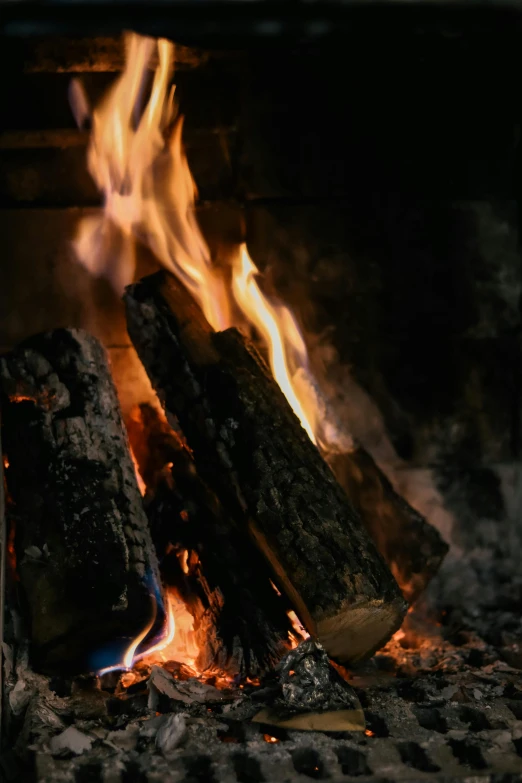 a close up of a fire in a fireplace, by Jan Rustem, winter setting, paul barson, multiple stories, promo image