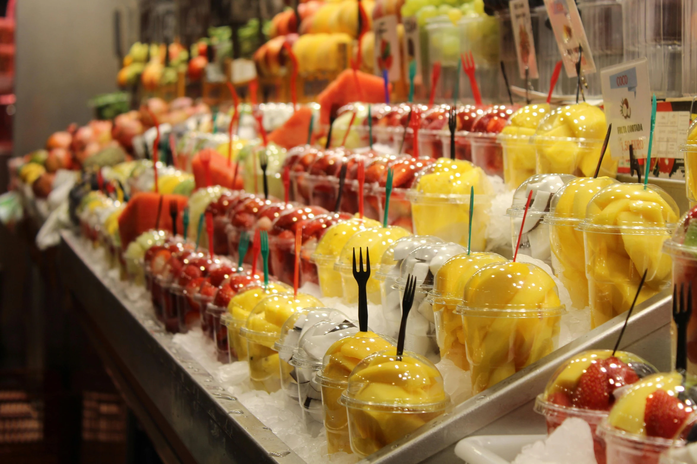 a display filled with lots of different types of fruit, by Hirosada II, pexels, mountains of ice cream, slush, barcelona, 2 0 0 0's photo