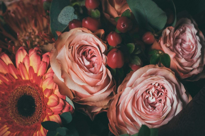 a bunch of flowers sitting on top of a table, pexels, romanticism, toned orange and pastel pink, red roses, autumnal, close up details