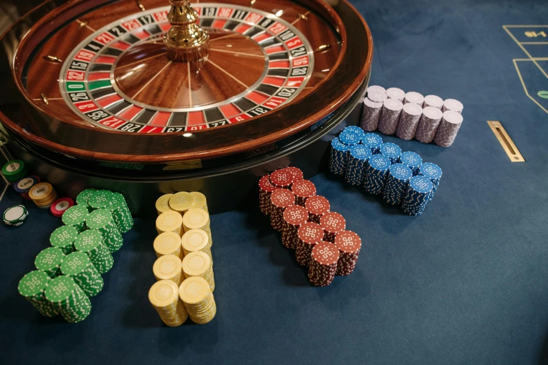 a casino table with chips and a roulet wheel, a screenshot, by Kristian Zahrtmann, pexels contest winner, renaissance, portrait of gigachad, cubes on table, high quality material bssrdf, blue gold and black