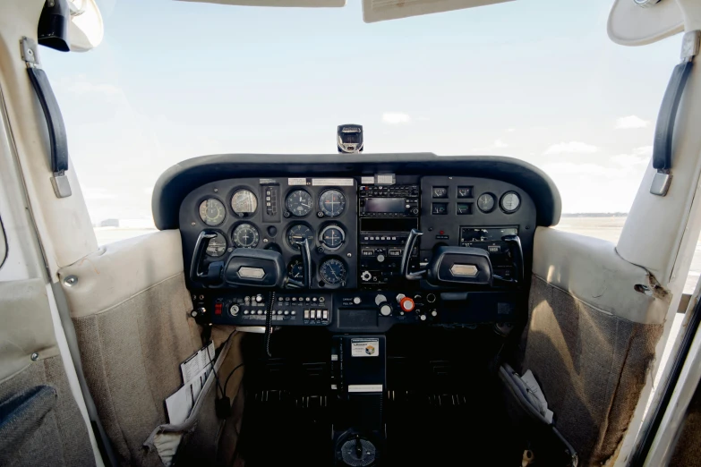 a view of the cockpit of a small plane, a portrait, unsplash, hurufiyya, 2000s photo, hyperdetailed, full front view, rectangle