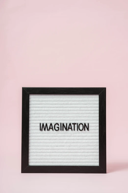 a letter board with the word imagination on it, trending on unsplash, magic realism, pink, society 6, framed poster, digital image