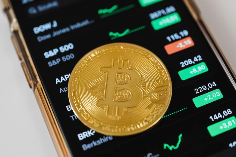 a gold bitcoin sitting on top of a smart phone, by Meredith Dillman, pexels, renaissance, square, charts, 1x, bl
