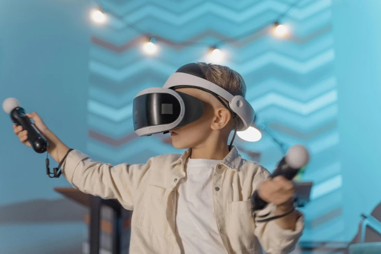 a little boy playing with a video game controller, a hologram, pexels, interactive art, wearing vr glasses, avatar image