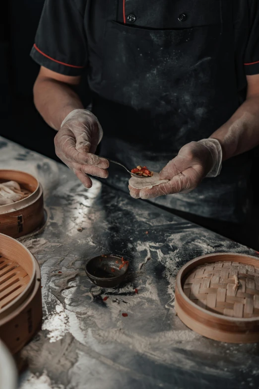 a man preparing dim dim dim dim dim dim dim dim dim dim dim dim dim dim dim dim dim dim dim dim dim dim dim dim dim, inspired by Cheng Zhengkui, pexels contest winner, culinary art photography, thumbnail, crispy buns, stitching