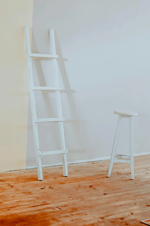 an empty room with a ladder leaning against the wall, inspired by Rachel Whiteread, unsplash, realistic rendering for stool, standing on a shelf, paul barson, white furniture