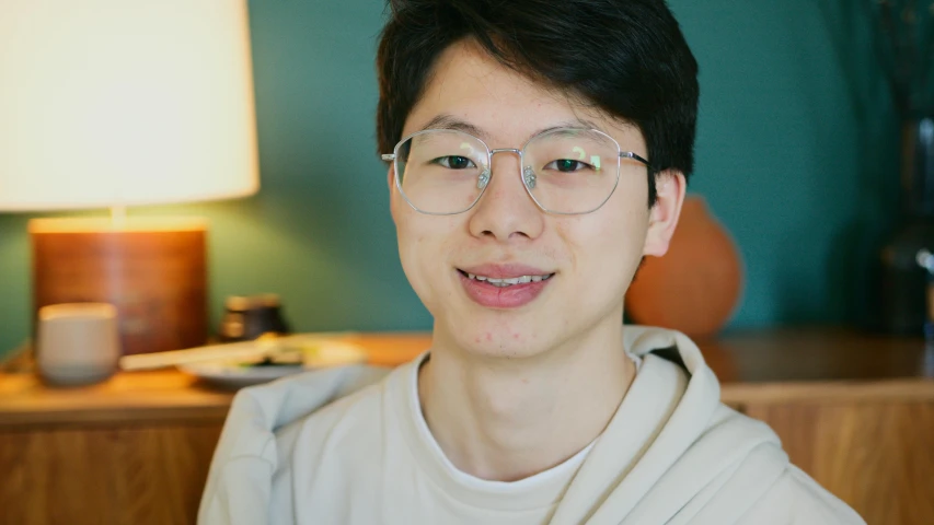 a close up of a person wearing glasses, a picture, ross tan, avatar image