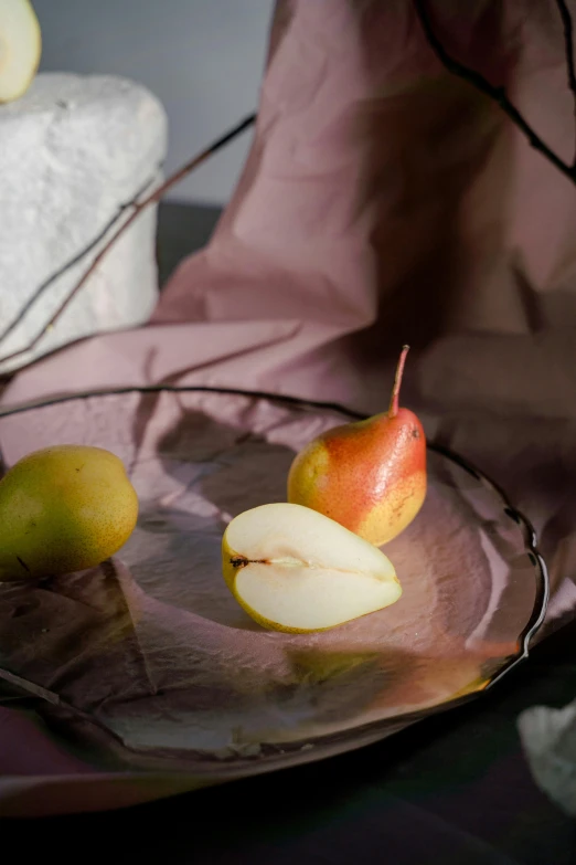 a couple of apples sitting on top of a glass plate, pears, showing curves, curated collection, silky smooth