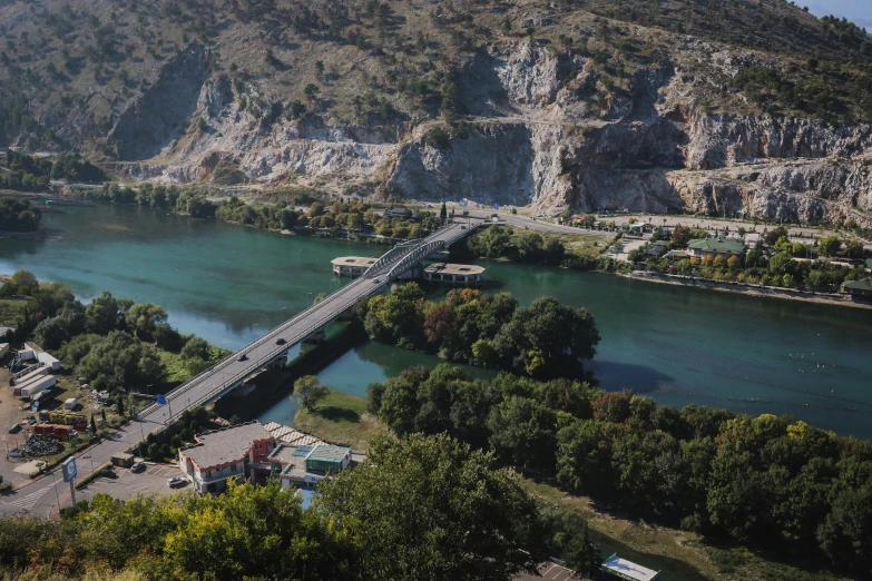 an aerial view of a bridge over a river, by Muggur, pexels contest winner, danube school, mountains river trees, thumbnail, samarkand, ultra realistic 8k octan photo