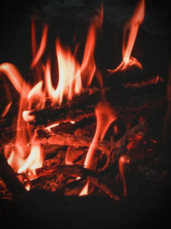 a close up of a fire in a fireplace, pexels contest winner, profile image, multiple stories, campfire background, background image