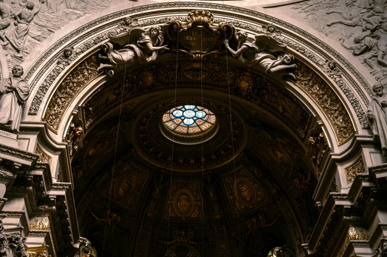 the inside of a church with a stained glass window, by Cagnaccio di San Pietro, unsplash contest winner, baroque, halo above head, sculptural, ornamental halo, style of caravaggio