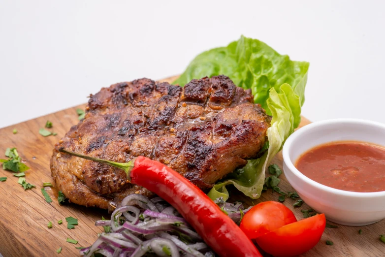 a wooden cutting board topped with meat and vegetables, a picture, greek ameera al taweel, profile image, pork, grill