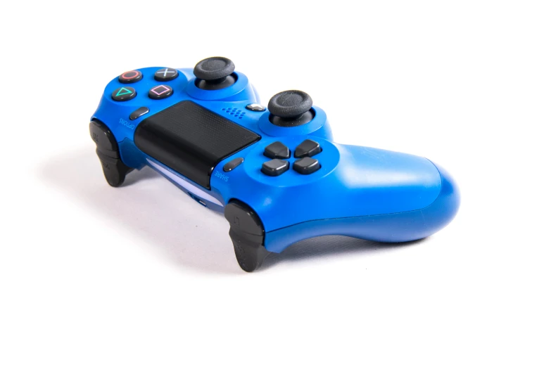 a close up of a controller on a white surface, electric blue, 4 0 0 0 0 0, portrait n - 9, mint
