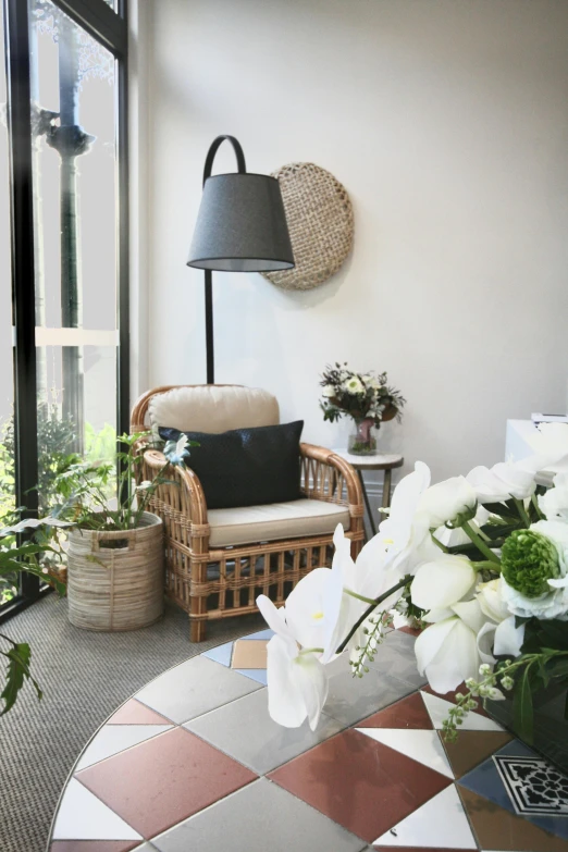 a living room filled with furniture and plants, wicker chair, soft bloom lighting, doctors office, 15081959 21121991 01012000 4k