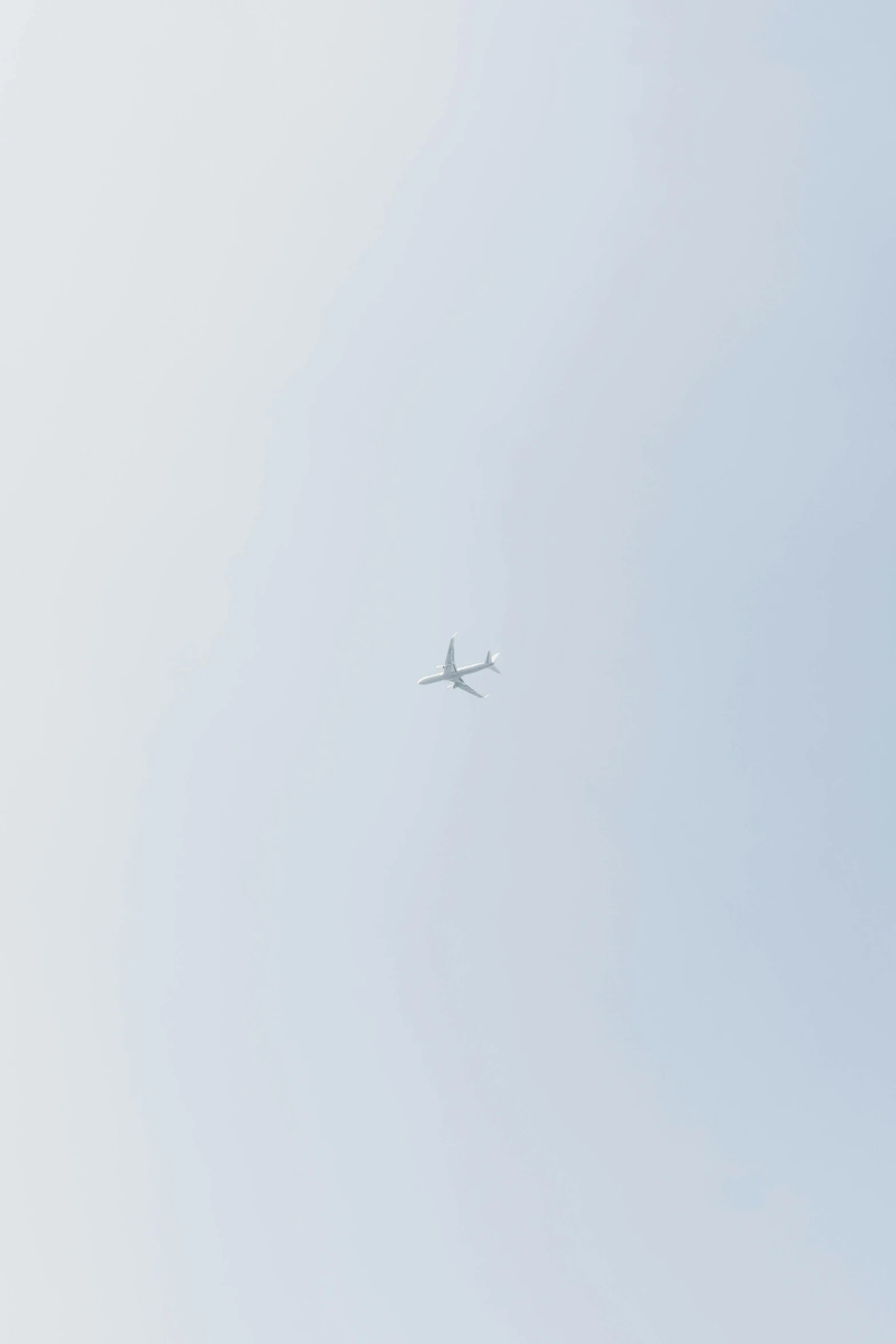 a large jetliner flying through a blue sky, a picture, unsplash, postminimalism, low quality footage, minimalistic!! simple, on a pale background, watch photo