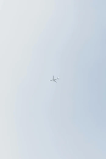 a large jetliner flying through a blue sky, a picture, unsplash, postminimalism, low quality footage, minimalistic!! simple, on a pale background, watch photo