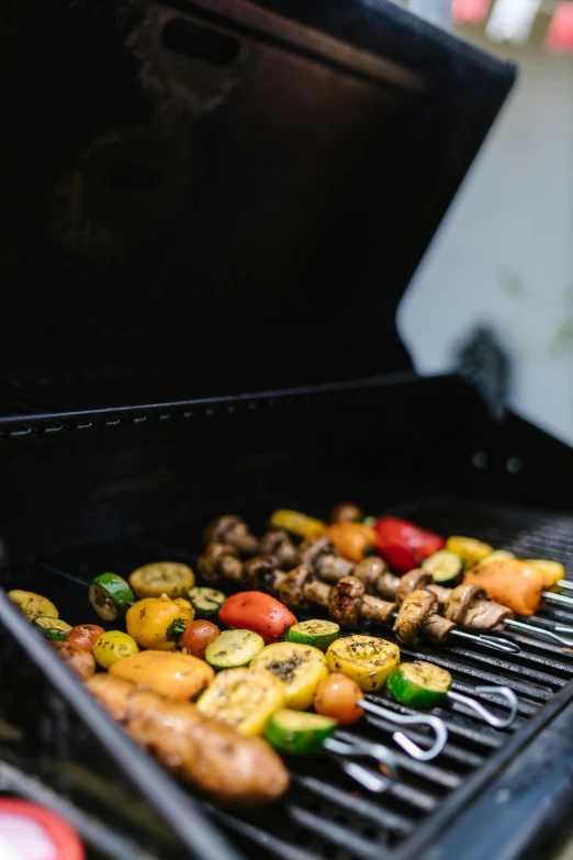 a close up of a grill with food on it, by Niko Henrichon, unsplash, vegetables, multiple stories, color photo, 15081959 21121991 01012000 4k