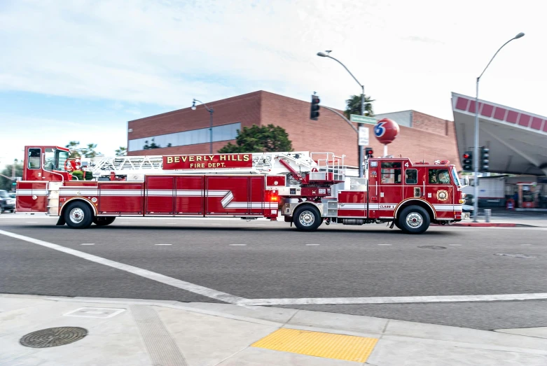 a red fire truck driving down a street, by Jeffrey Smith, unsplash, hyperrealism, 1600 south azusa avenue, profile image, 2 5 6 x 2 5 6 pixels, parade floats