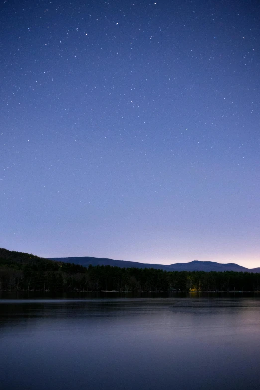 a body of water with a mountain in the background, blue hour stars, new hampshire mountain, digital image, today\'s featured photograph 4k
