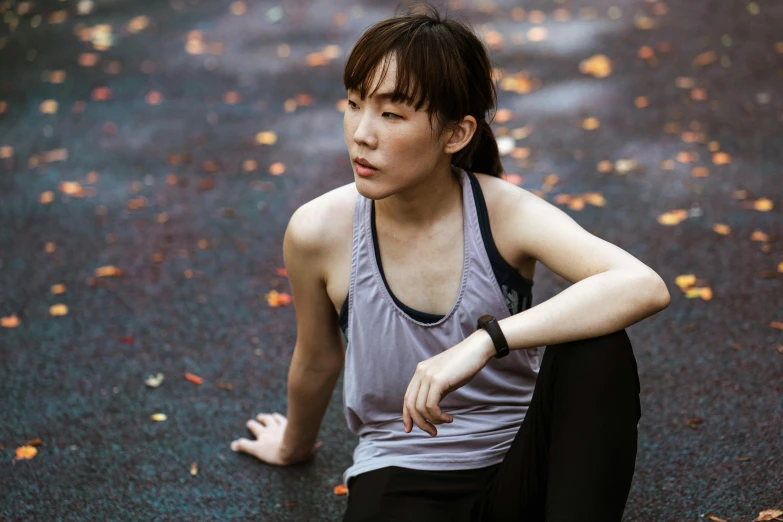 a woman sitting on the ground in the rain, inspired by Zhou Wenjing, pexels contest winner, violet tight tanktop, confident relaxed pose, profile image, trapped on a hedonic treadmill