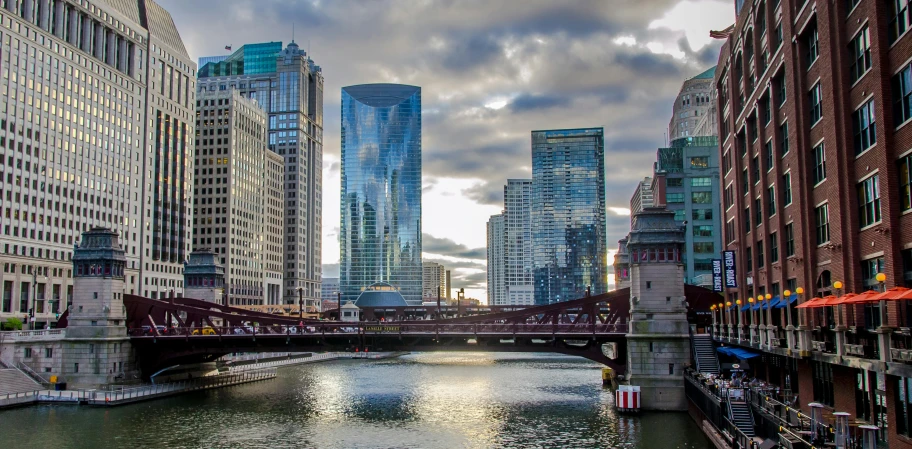 a river running through a city next to tall buildings, holding a postcard from chicago, architecture photo, slide show, featured