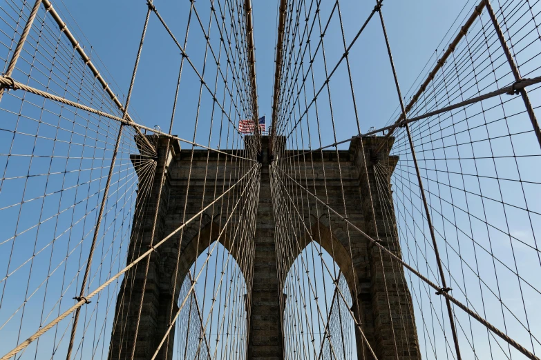 a view of the brooklyn bridge from below, unsplash, fan favorite, high resolution photograph, high - angle view, fully frontal view