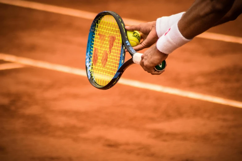 a person holding a tennis racket and a tennis ball, by Niko Henrichon, pexels contest winner, square, yellow and ornage color scheme, hard clay, sports broadcast