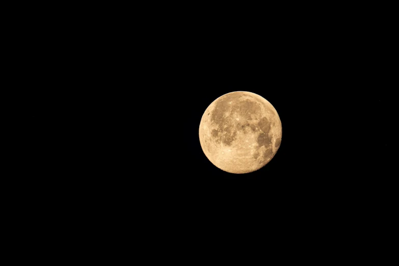 a full moon is seen in the dark sky, an album cover, by Carey Morris, pexels, minimalism, yellowish full moon, jupiter moon mars, low iso, ☁🌪🌙👩🏾