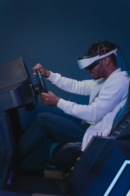 a man in a white shirt is playing a video game, a hologram, inspired by Jules Chéret, pexels, afrofuturism, alien racing drivers, avatar image, wearing a gaming headset, indigo