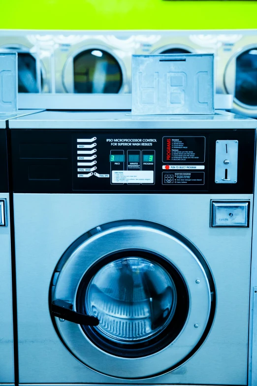 a row of washing machines sitting next to each other, a portrait, unsplash, commercial photo, high contrast, sparkly, thumbnail