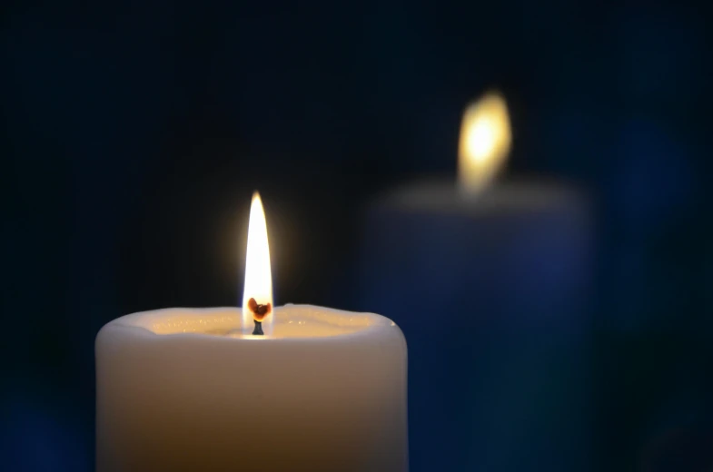 a couple of white candles sitting next to each other, pexels, blue, profile picture 1024px, light coming in from the left, ignant