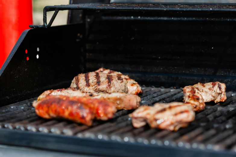 a close up of some meat on a grill, by Joe Bowler, 3 - piece, profile image, epicurious, fan favorite