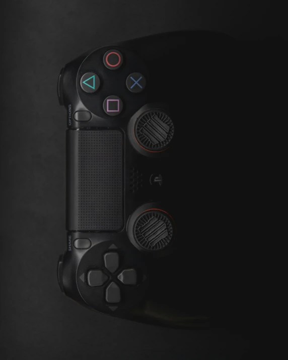 a close up of a video game controller, unsplash, minimalism, square, panel of black, uploaded, black