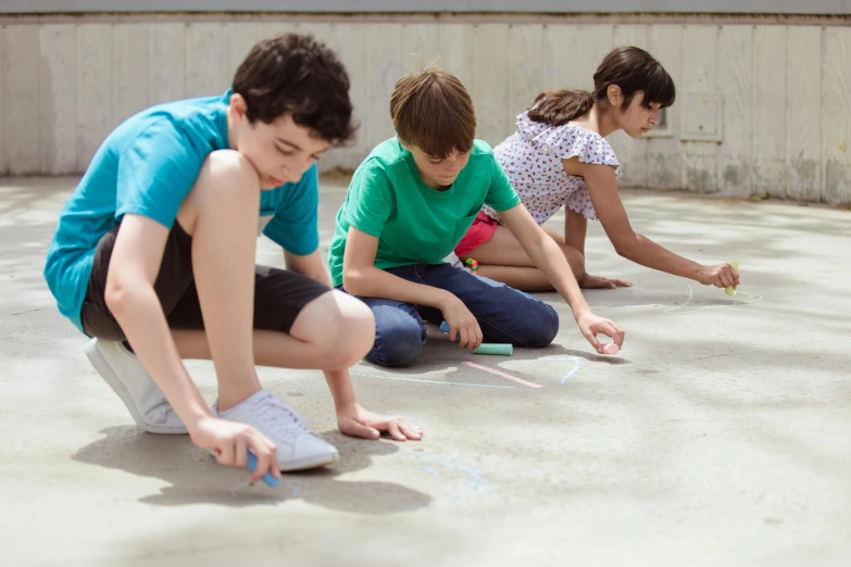 a group of children sitting on the ground drawing with chalk, pexels contest winner, interactive art, rule of thirds, pavements, animation still, profile image