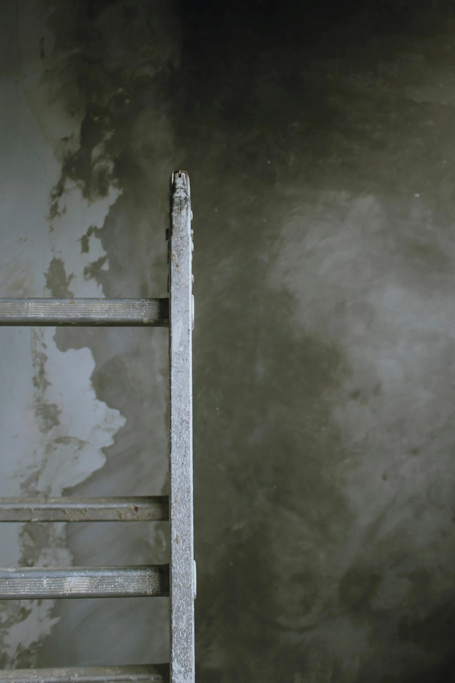 a ladder leaning against a wall in a room, by Elsa Bleda, conceptual art, scratched metal, video still, concrete ), contain