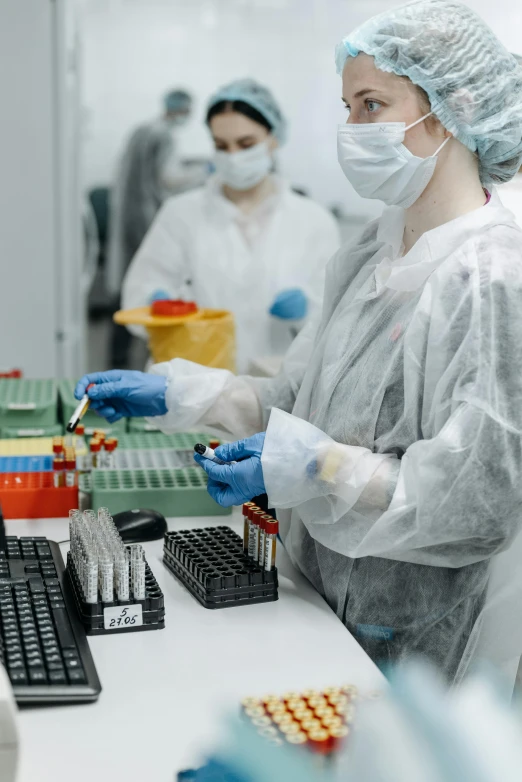 a group of people working in a lab, a picture, by Adam Marczyński, shutterstock, small vials and pouches on belt, thumbnail, 15081959 21121991 01012000 4k, surgical equipment