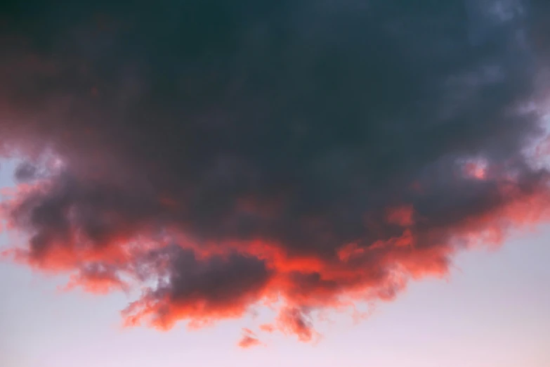 a couple of cows standing on top of a lush green field, inspired by Elsa Bleda, unsplash, aestheticism, ominous red cumulonimbus clouds, sunset photo, cloud nebula, gradient red to black