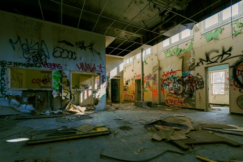 a room with lots of graffiti on the walls, a matte painting, unsplash contest winner, demolition, 2022 photograph, vhs colour photography, school class