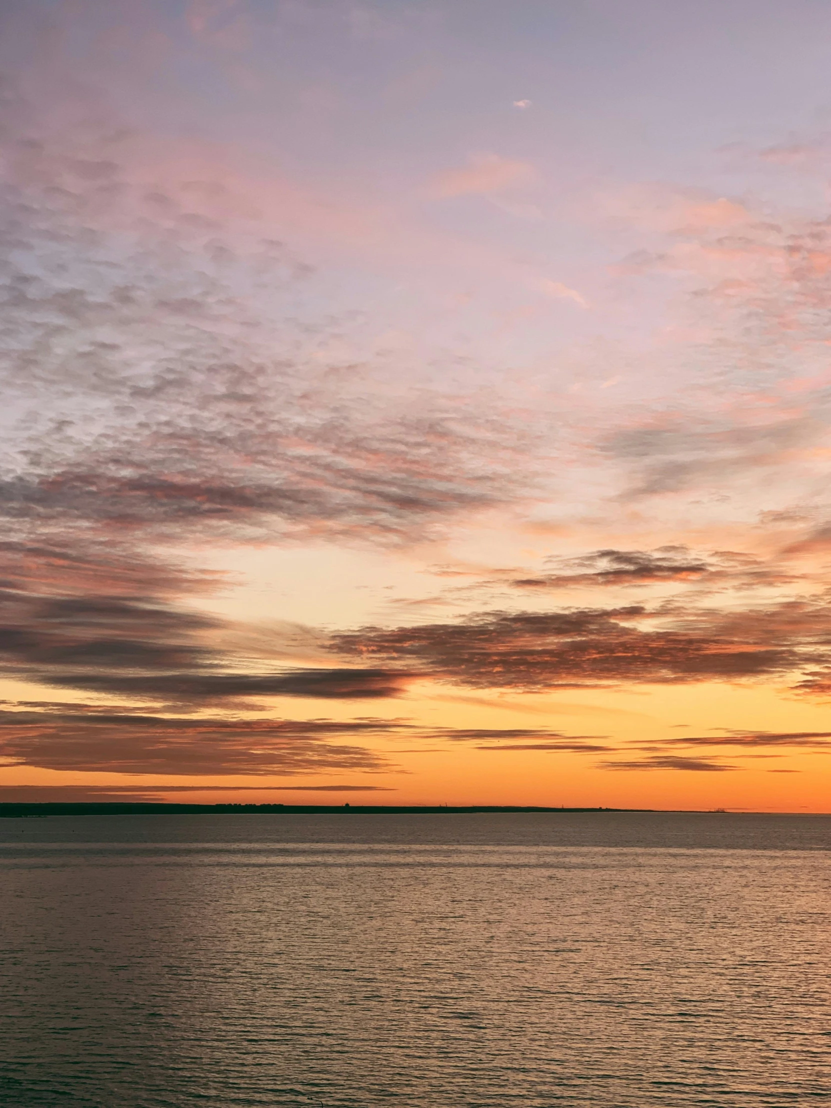 a large body of water under a cloudy sky, pexels contest winner, romanticism, orange / pink sky, manly, today\'s featured photograph 4k, panoramic