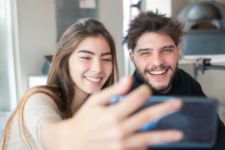 a man and a woman taking a selfie, trending on pexels, happening, gaming, avatar image, playful smile, front camera