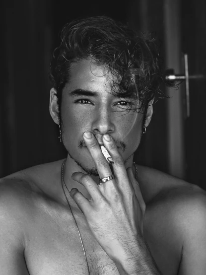 a shirtless man smoking a cigarette in front of a mirror, a black and white photo, inspired by Randy Vargas, avan jogia angel, highly detailed -, yanjun chengt, portrait of a handsome