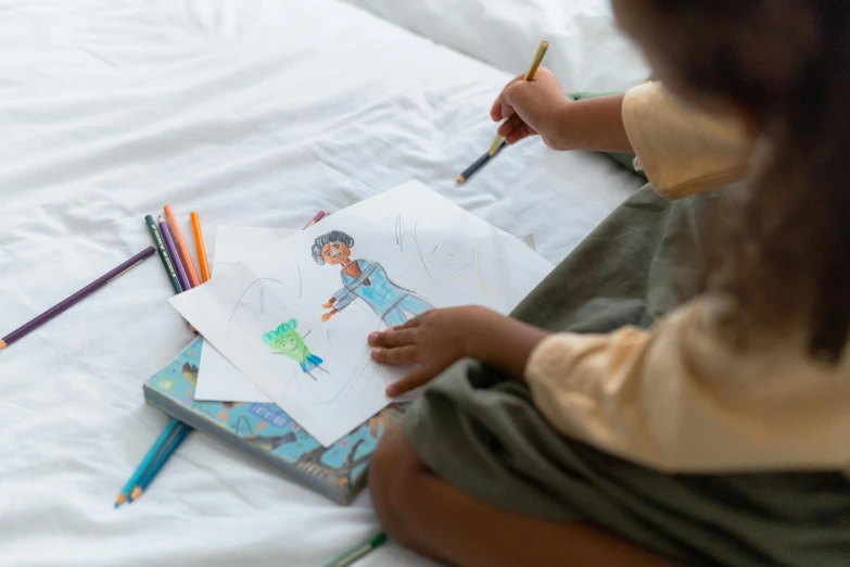 a little girl sitting on a bed drawing with colored pencils, a child's drawing, by Nicolette Macnamara, pexels contest winner, eva elfie, drawing sketches on his notebook, portrait willow smith, coloured in teal and orange