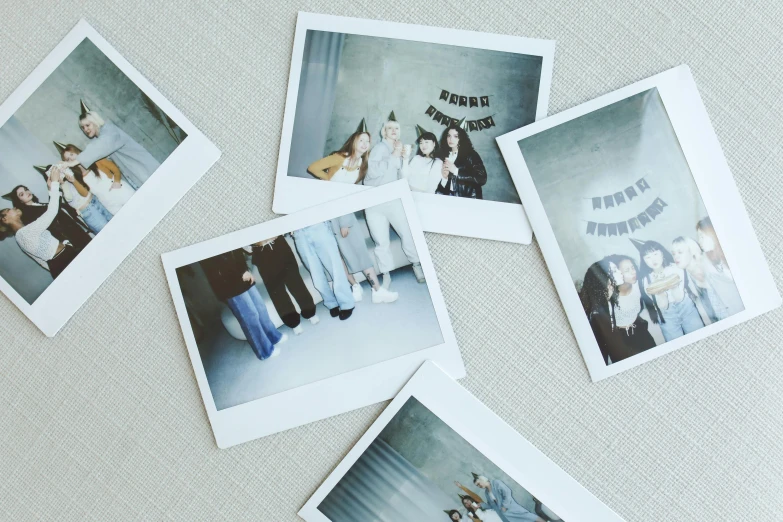 a bunch of polaroids sitting on top of a table, inspired by Elsa Bleda, unsplash, square pictureframes, photographic print, celebration, 7 0 mm photo