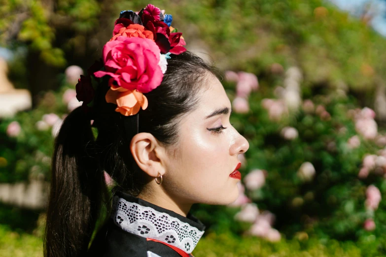 a woman with a flower in her hair, inspired by Frida Kahlo, pexels contest winner, hailee steinfeld, middle shot, folklorico, charli xcx