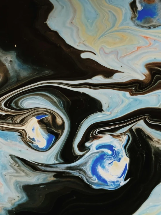 a close up of a painting of a body of water, trending on unsplash, space art, black marble, swirly tubes, blue, ships